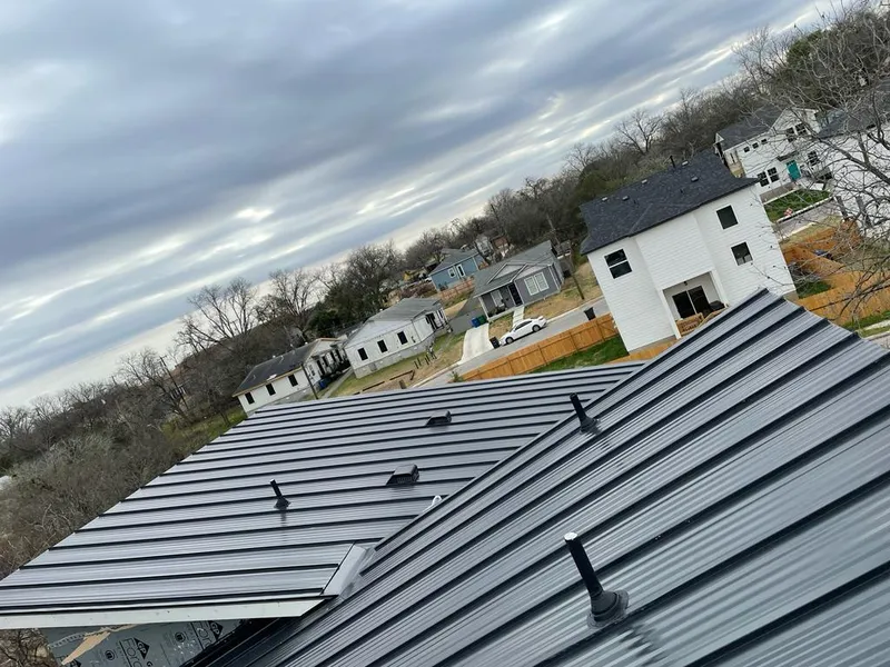 Standing seam metal roof panels with vents for Skylight Repair in Nederland